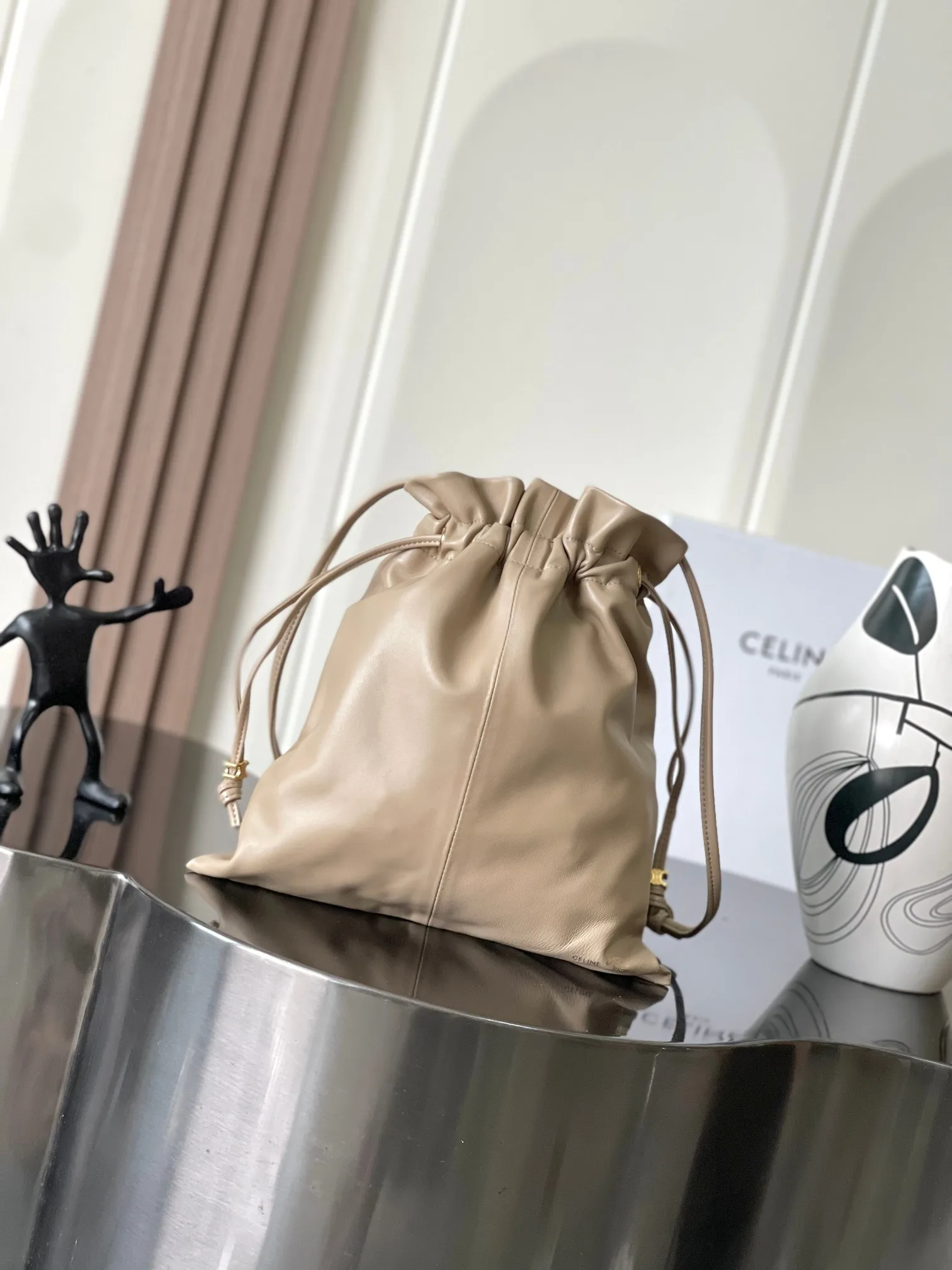 Celine Lambskin Triomphe Bucket Bag product photo from LabelPicks