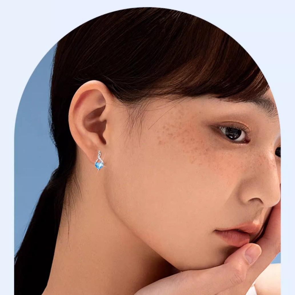 S925 sterling silver heart-shaped earrings for women, elegant and versatile, featuring a Möbius strip design with a small fish and heart-shaped cubic zirconia