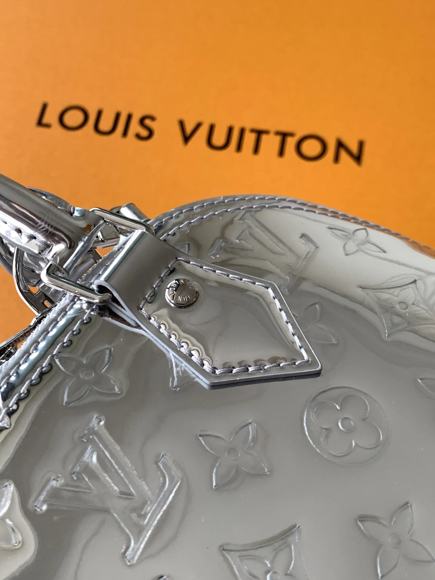 Louis Vuitton Alma Silver Monogram Canvas Top Handle Bag product photo from LabelPicks