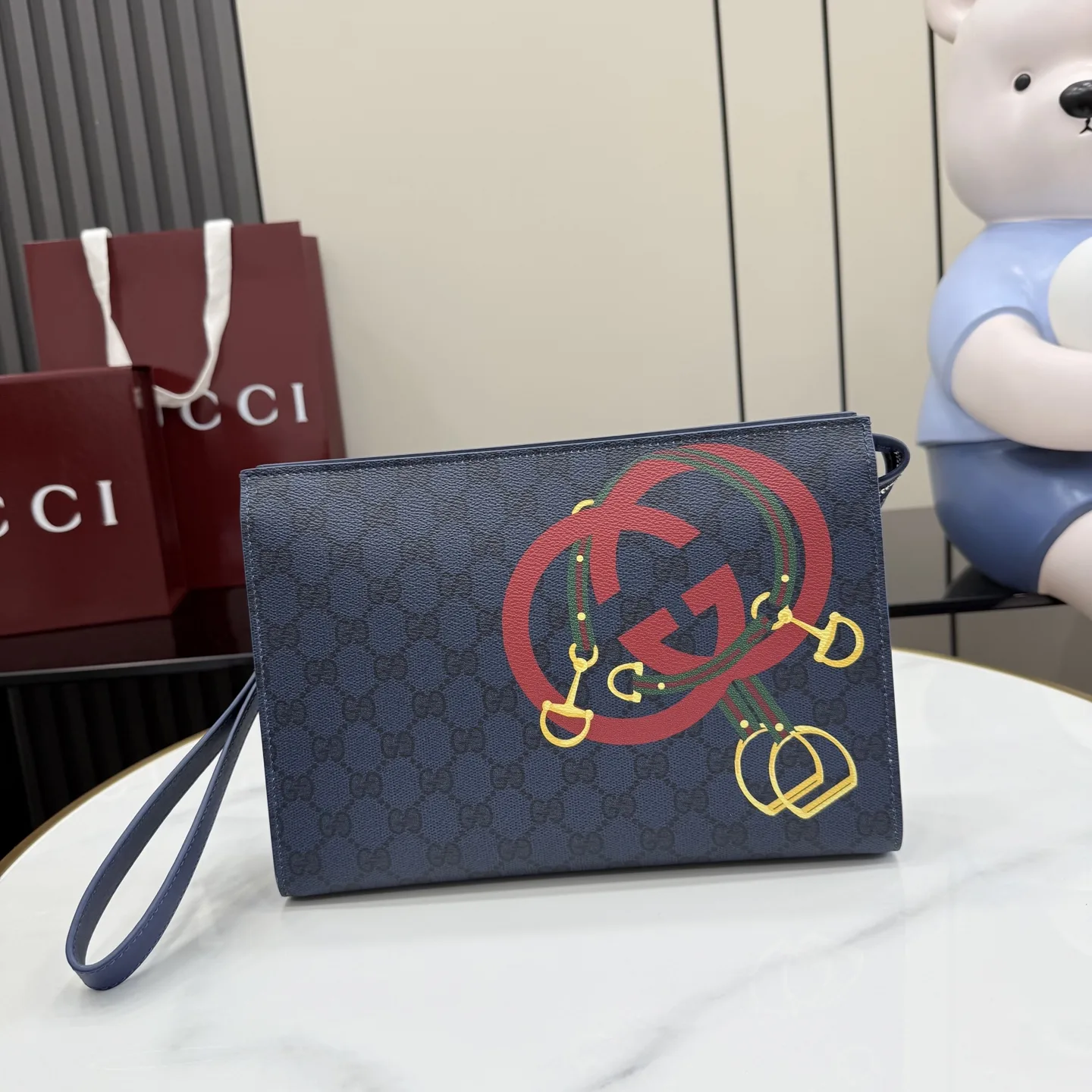 Gucci Navy GG Supreme Canvas Clutch product photo from LabelPicks