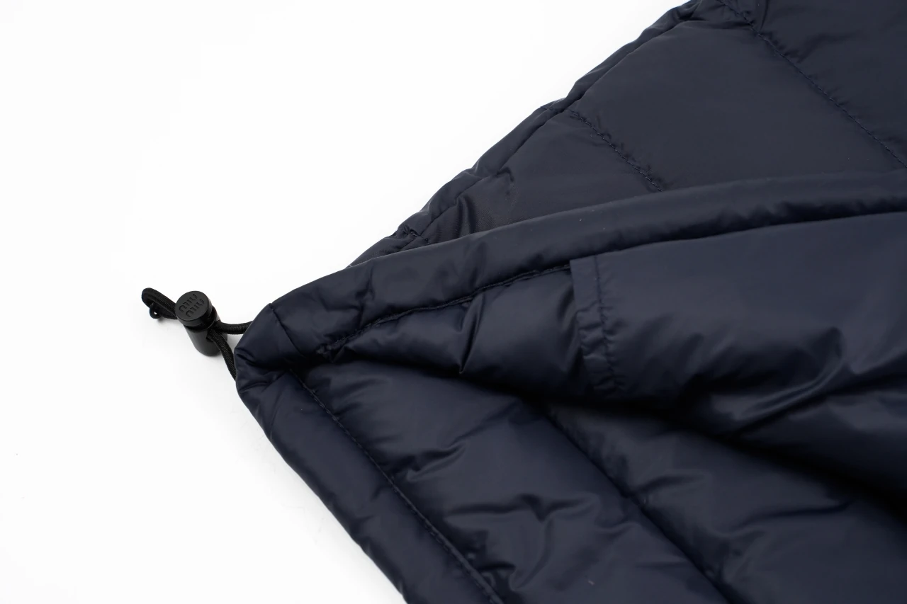 Miu Miu Navy Logo Quilted Down Vest product photo from LabelPicks