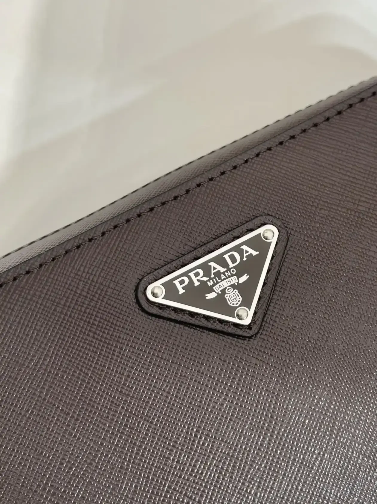 Prada Grained Leather Clutch product photo from LabelPicks