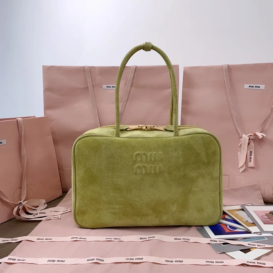 Miu Miu Canvas and Leather Crossbody Bag product photo from LabelPicks