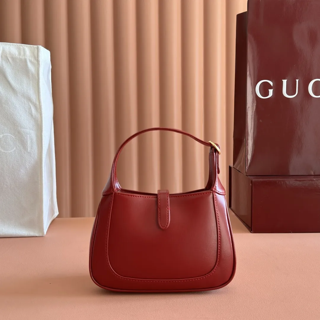 Gucci Canvas and Leather Jackie Shoulder Bag product photo from LabelPicks