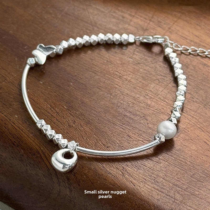 Original small silver nugget pearl bracelet, a trendy and artistic piece in the Chinese retro style, featuring a new Chinese design with fragmented silver accents, a popular and fashionable bracelet