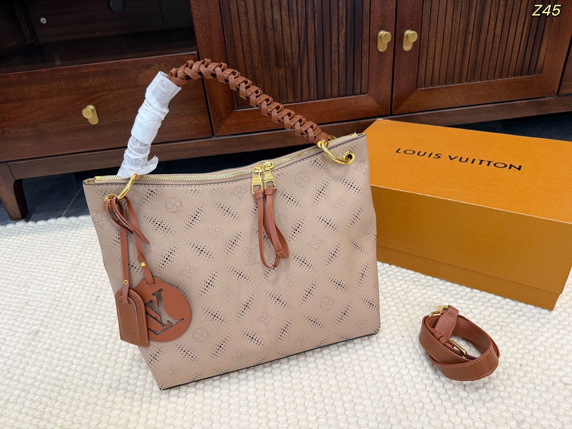 LV Perforated handbags