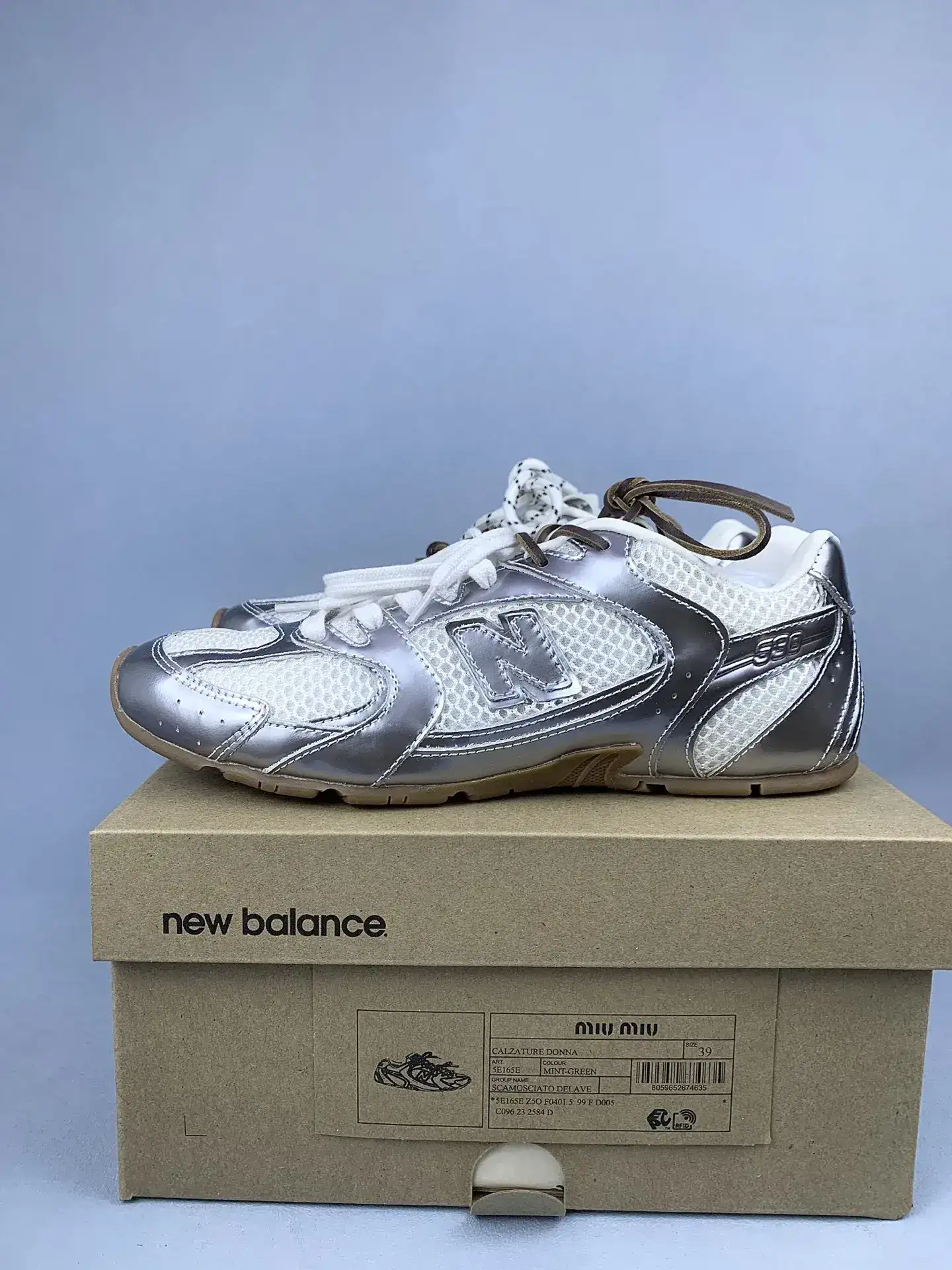 New Balance X Miu Miu 530 SL metallic leather and mesh sneakers product photo from LabelPicks