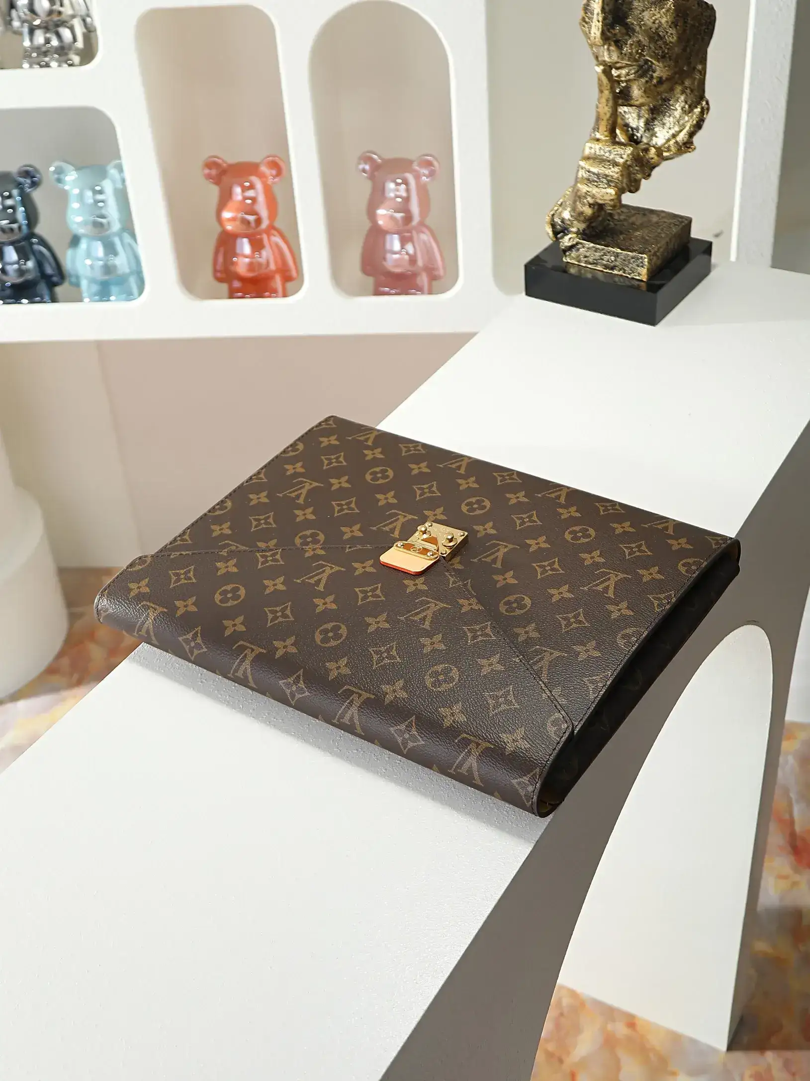 Louis Vuitton Brown Monogram Canvas Clutch product photo from LabelPicks