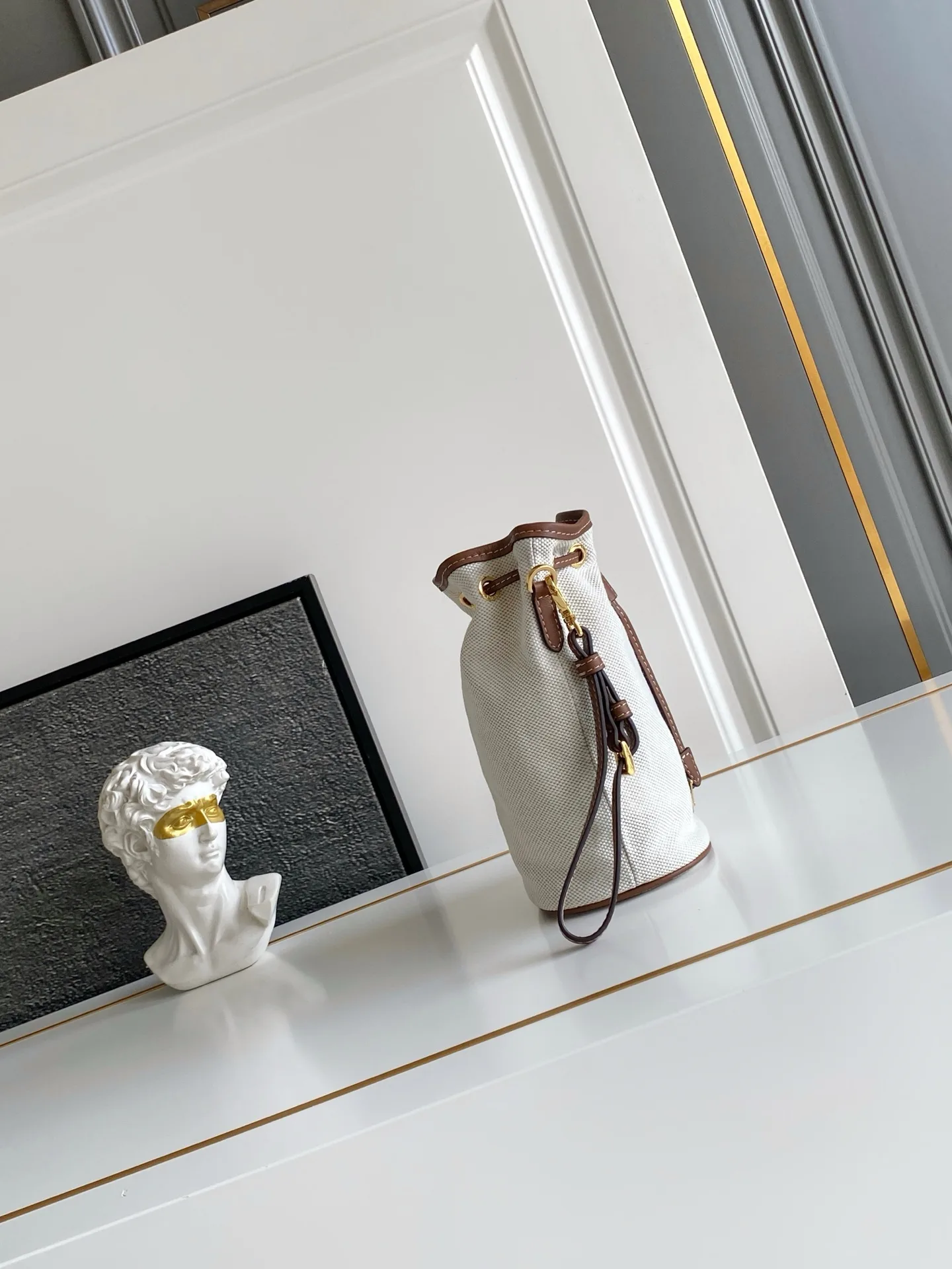 Prada Canvas and Leather Bucket Bag product photo from LabelPicks