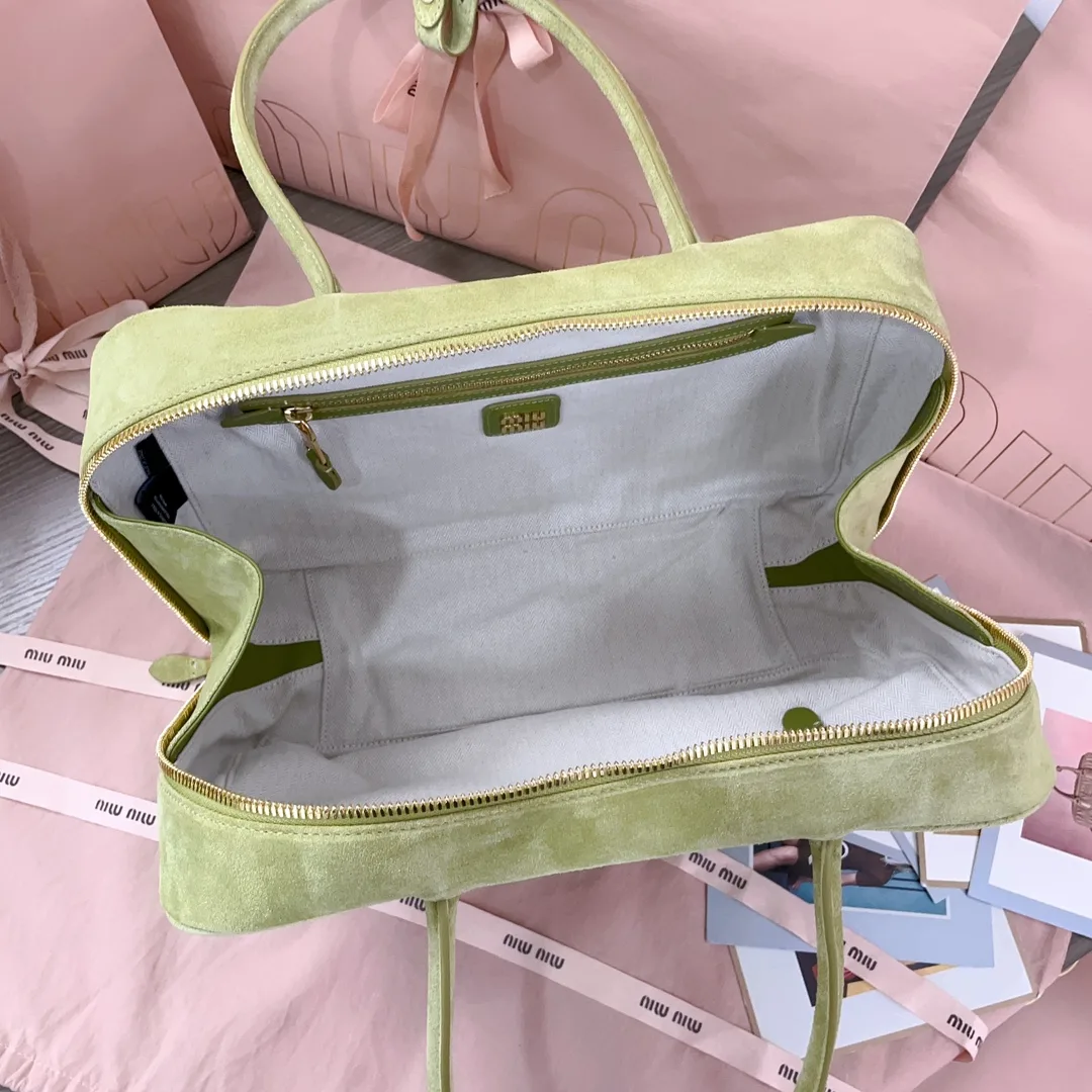 Miu Miu Canvas and Leather Crossbody Bag product photo from LabelPicks