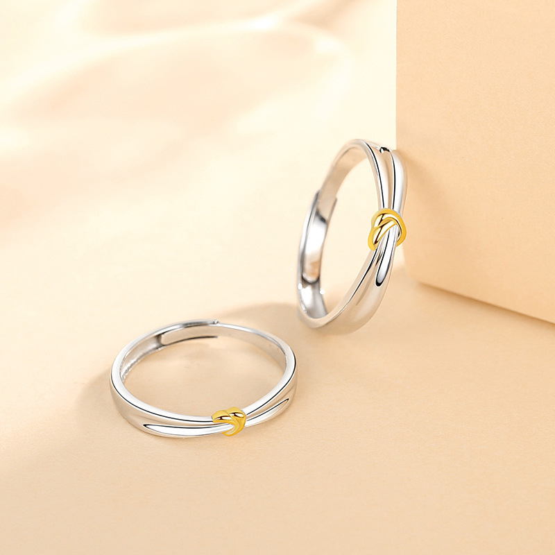 Matching couple rings, a pair of sterling silver rings with a unique design featuring a double V and a heart, a creative and stylish ring for couples