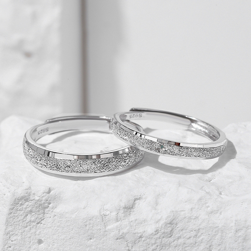 Korean-style sterling silver couple rings, featuring a starry sky design, with a luxurious and sophisticated matte finish, a simple band design, adjustable opening, and a trendy style