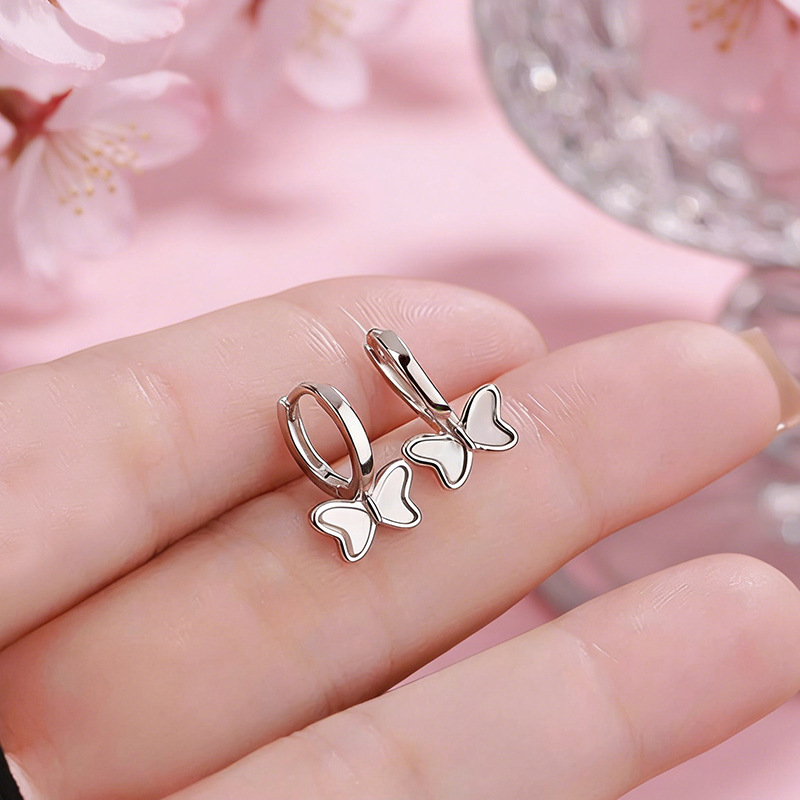 999 pure silver bow-shaped earrings with mother-of-pearl accents, featuring a forest-inspired French style, perfect for a chic and fresh look, ideal as a gift for close female friends