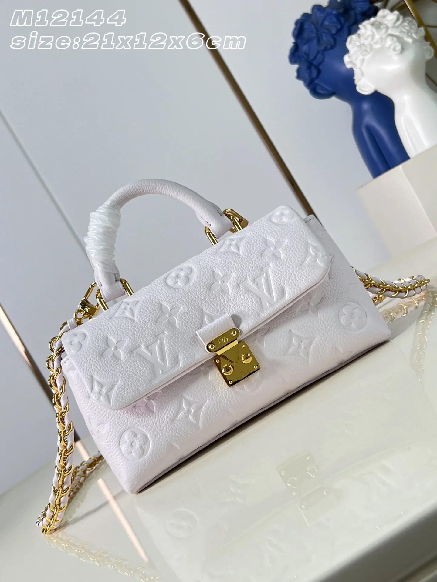Louis Vuitton Madeleine Woven Leather Top Handle Bag product photo from LabelPicks