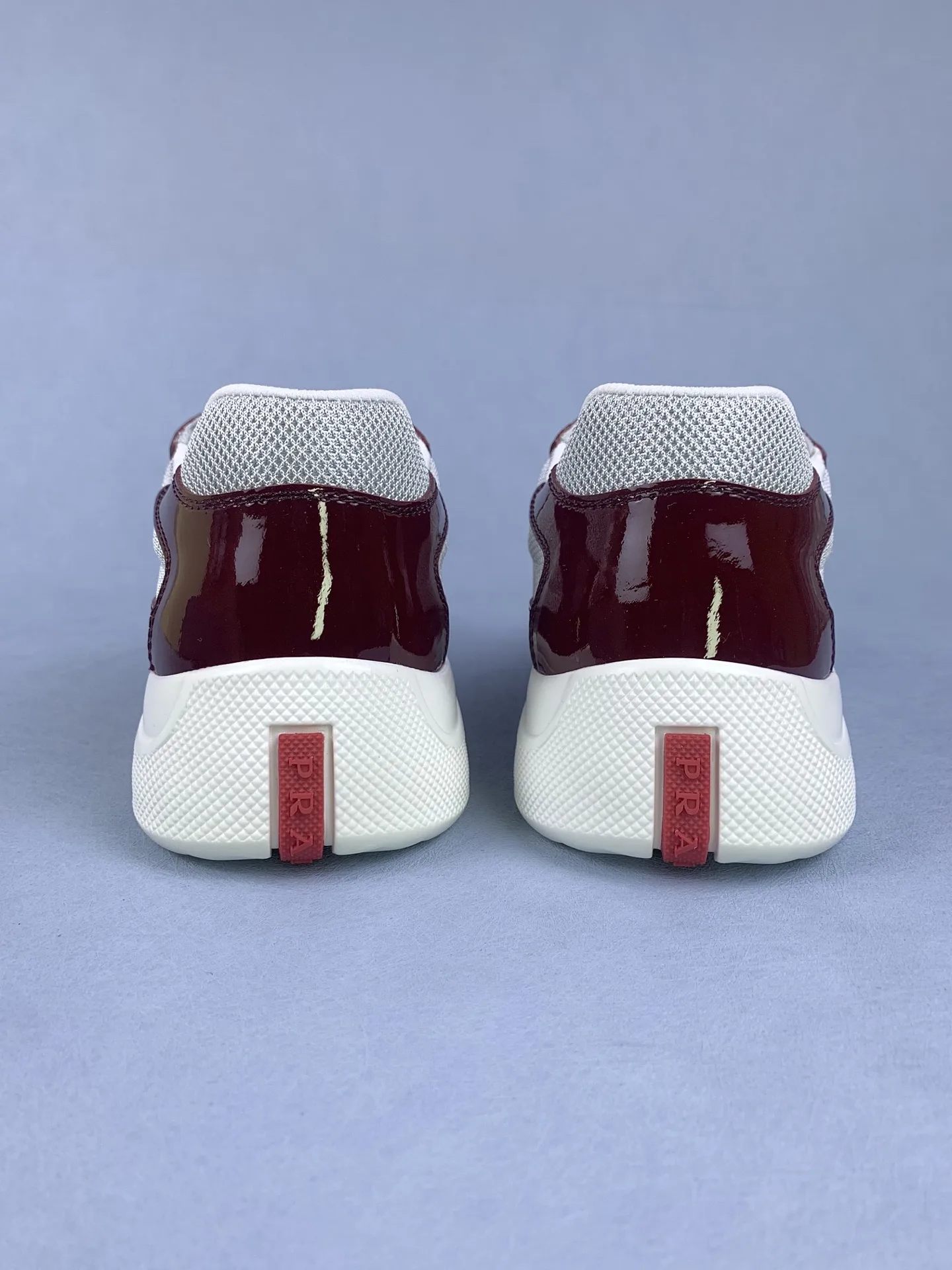 Patent leather and technical fabric Prada America's Cup sneakers product photo from LabelPicks