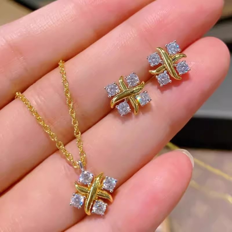 S925 sterling silver cross-shaped earrings featuring four cubic zirconia stones, a lightweight and luxurious design for women, perfect for summer, with a unique and trendy aesthetic, and popular among influencers