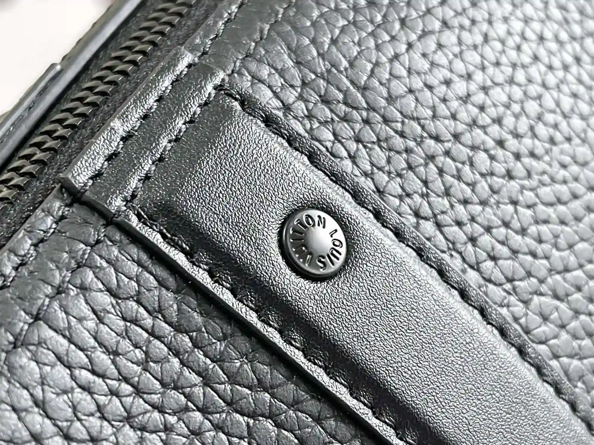 Louis Vuitton Grained Leather Keepall Crossbody Bag product photo from LabelPicks