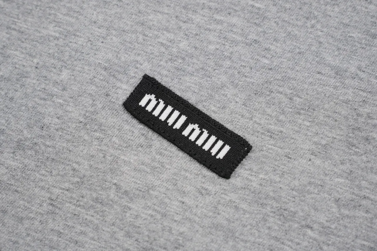Miu Miu Grey Badge Embroidered Crewneck Long Sleeve T-Shirt product photo from LabelPicks