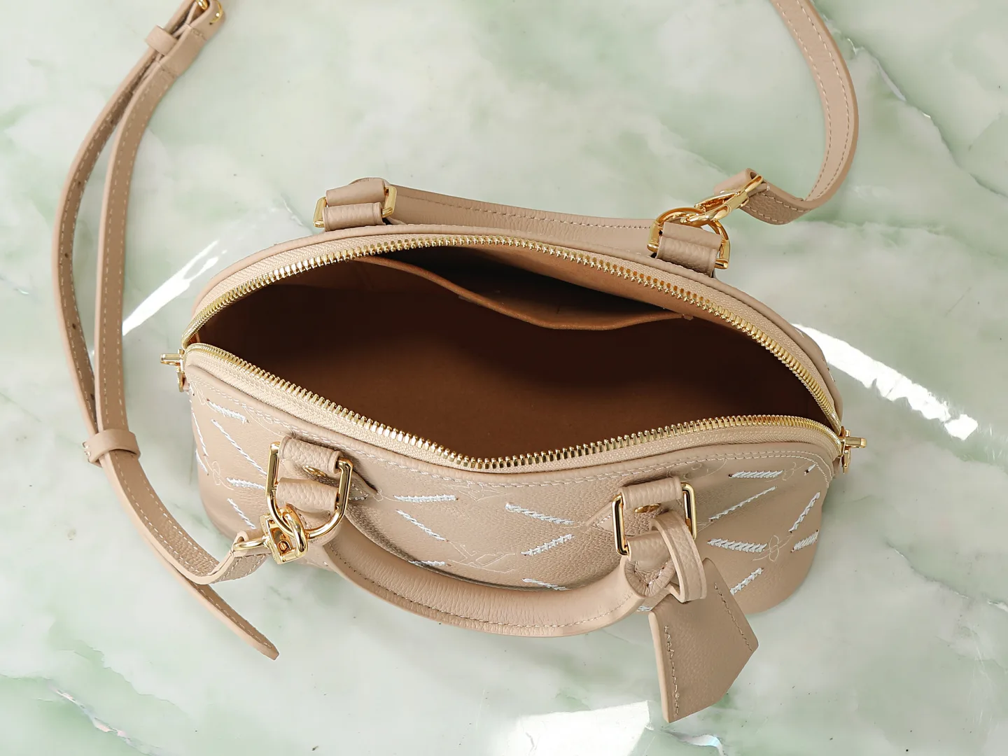 Louis Vuitton Brown Alma Quilted Leather Top Handle Bag product photo from LabelPicks