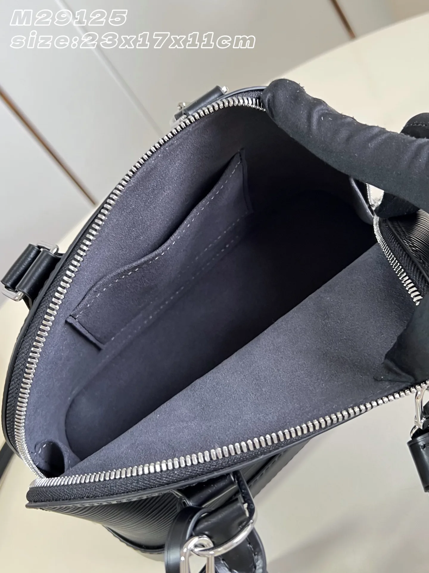 Louis Vuitton Black Alma Top Handle Bag product photo from LabelPicks