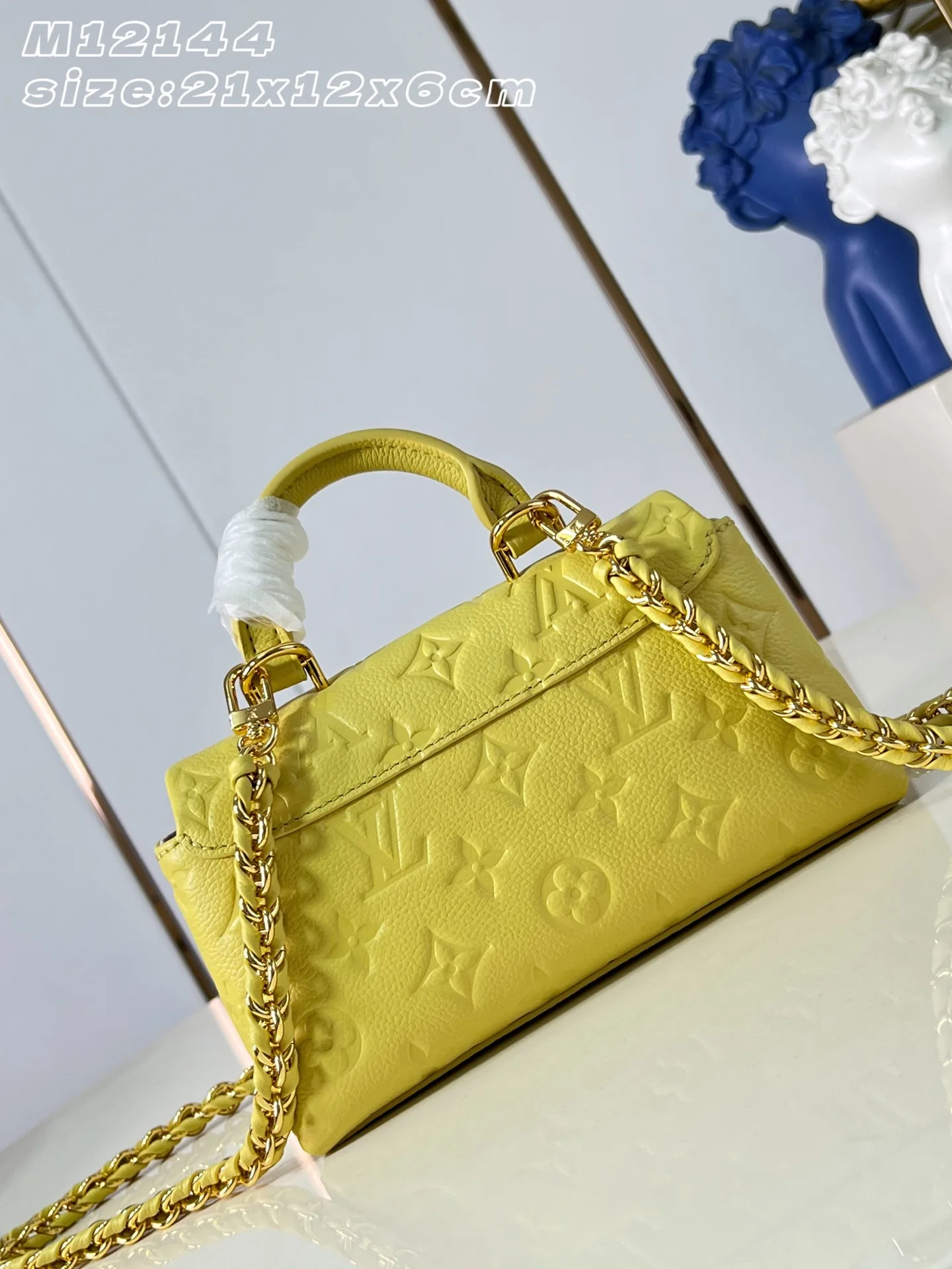 Louis Vuitton Woven Leather Madeleine Top Handle Bag product photo from LabelPicks