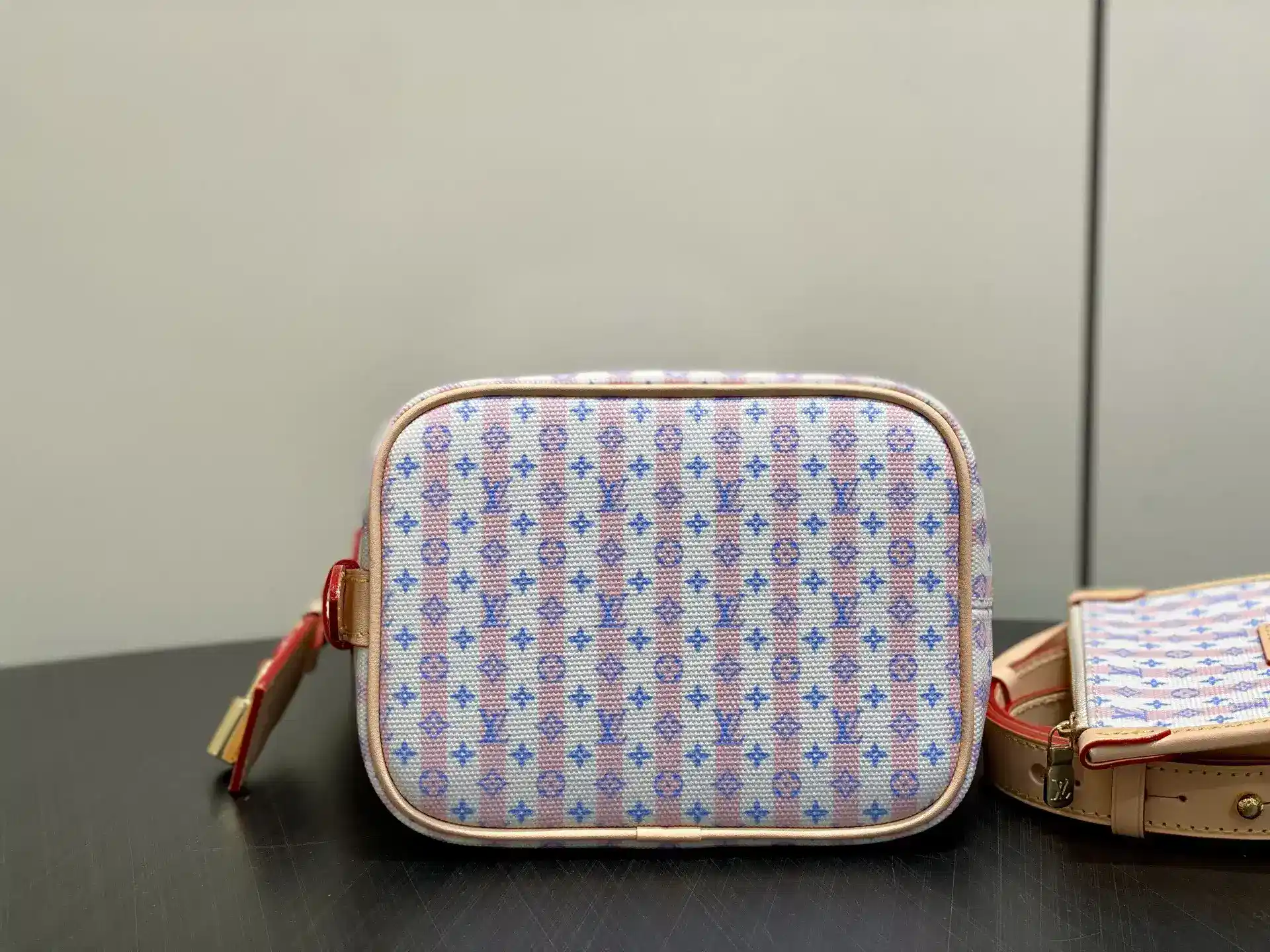 Louis Vuitton Pink Canvas and Leather Bucket Bag product photo from LabelPicks