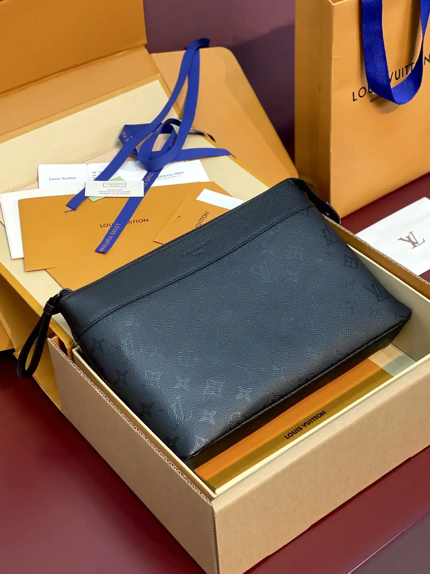 Louis Vuitton Black Pochette Canvas and Leather Clutch product photo from LabelPicks