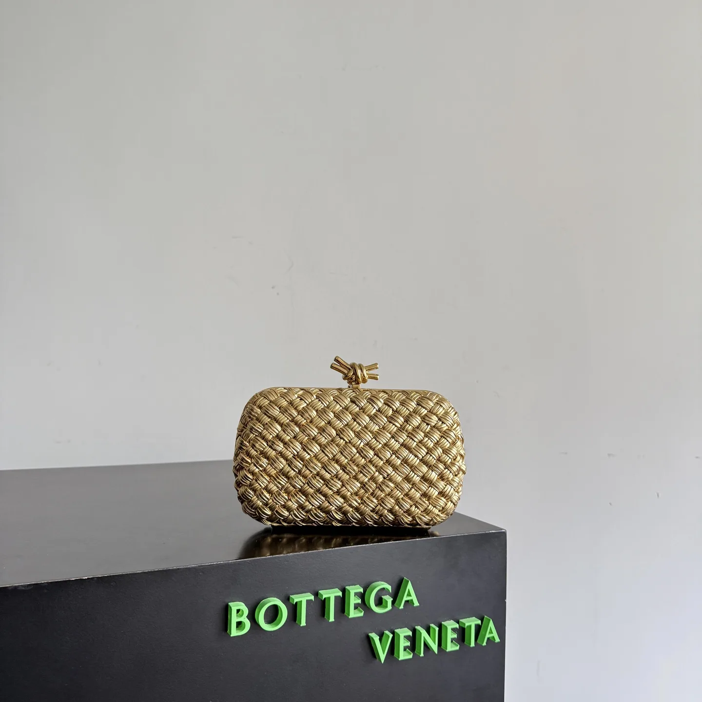 Bottega Veneta Intrecciato Woven Leather Knot Clutch product photo from LabelPicks