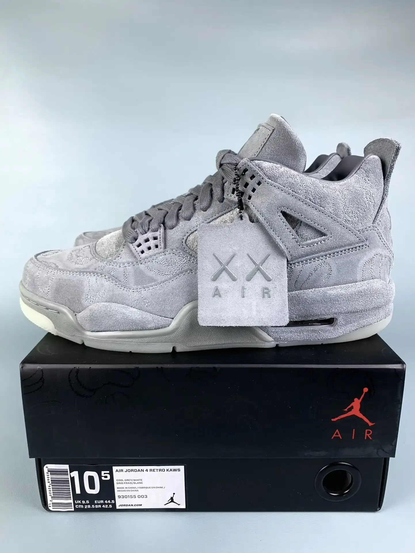 KAWS x Air Jordan 4 “Cool Grey” Shoes product photo from LabelPicks