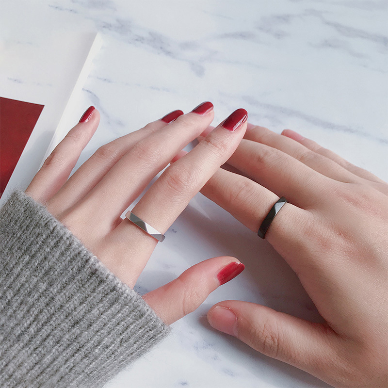 S925 sterling silver couple rings, with a black and white matte finish and a diamond-shaped design, suitable for couples, students, and everyday wear; adjustable size