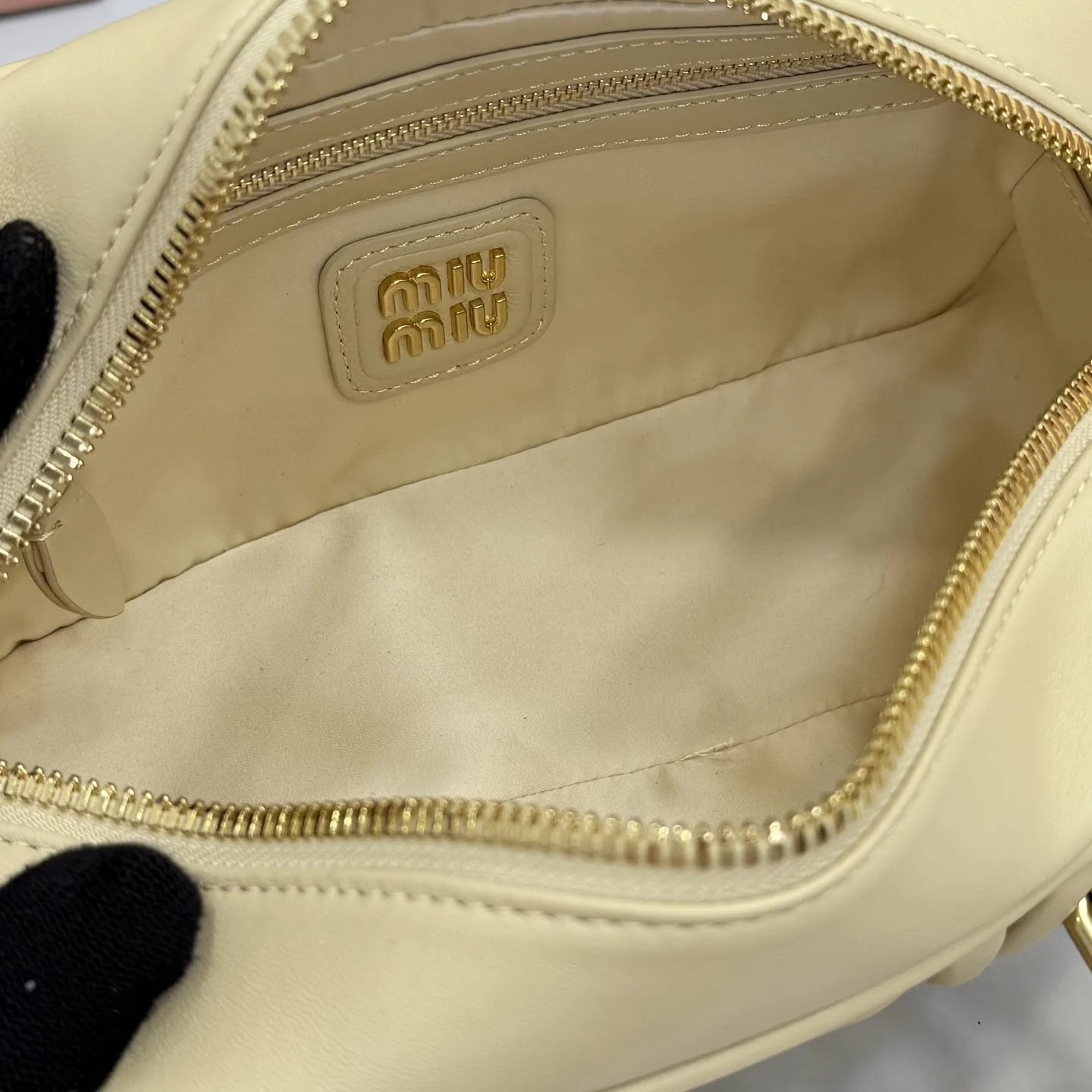 Miu Miu Lambskin Matelasse Top Handle Bag product photo from LabelPicks