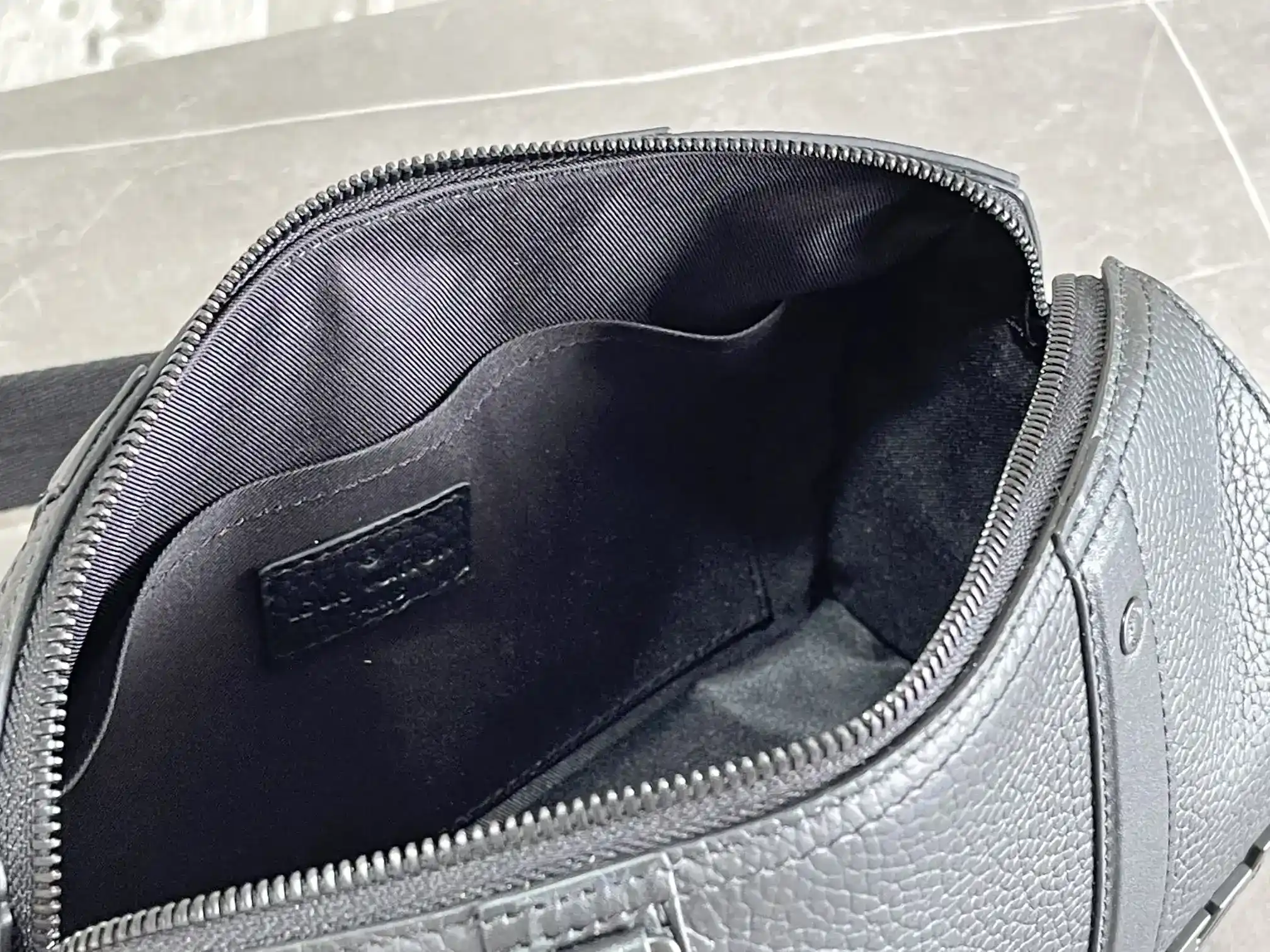 Louis Vuitton Grained Leather Keepall Crossbody Bag product photo from LabelPicks