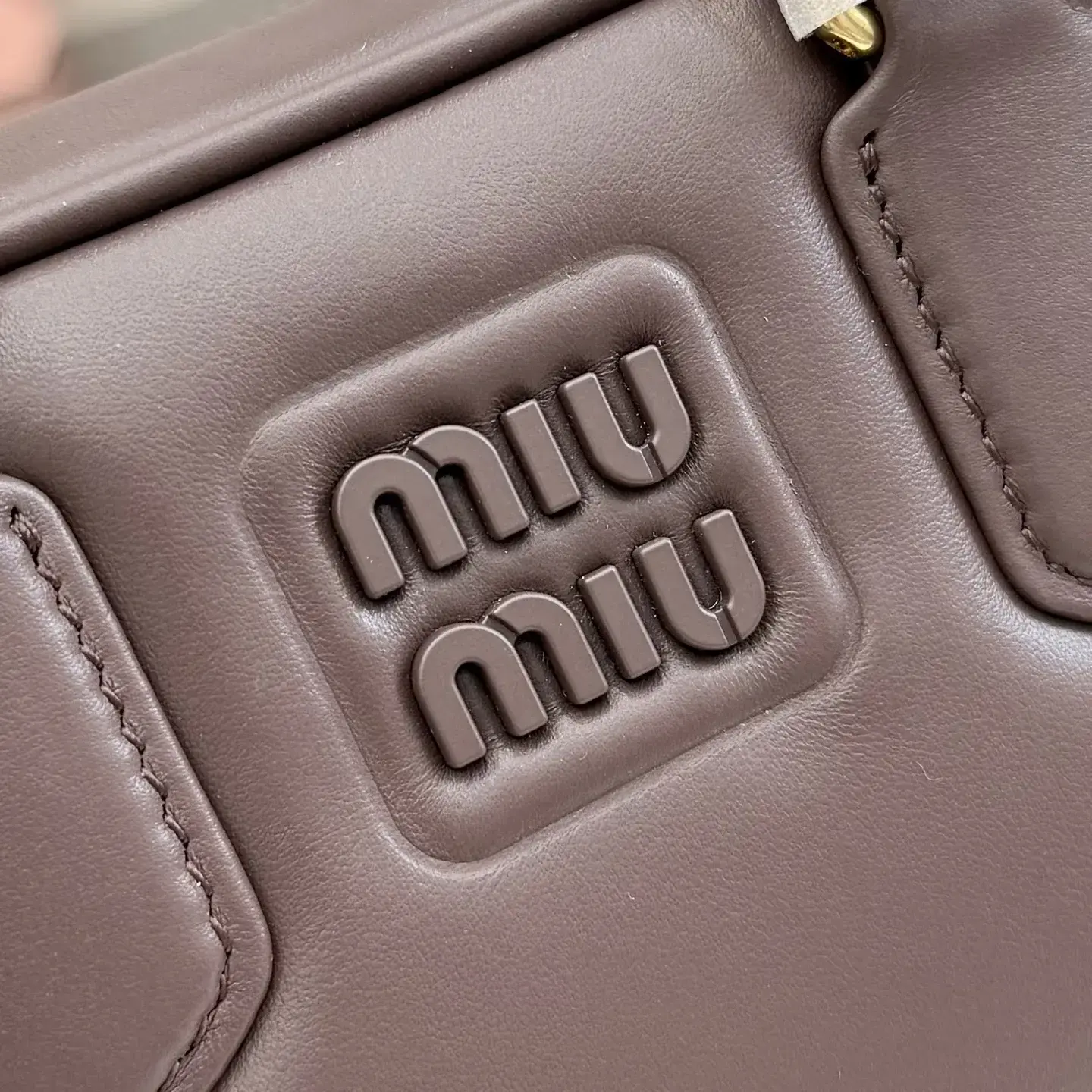 Miu Miu Calfskin Matelasse Top Handle Bag product photo from LabelPicks