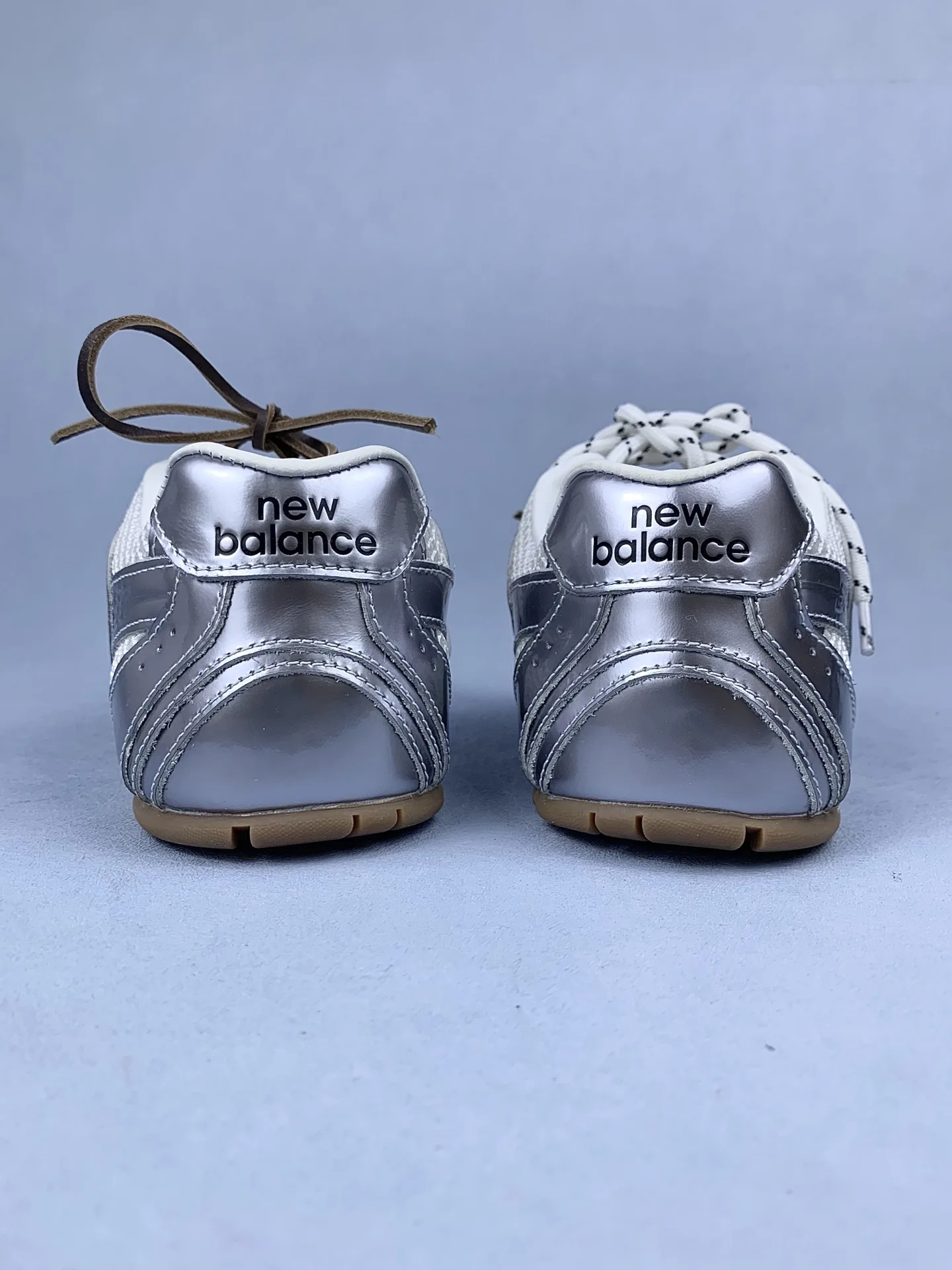 New Balance X Miu Miu 530 SL metallic leather and mesh sneakers product photo from LabelPicks