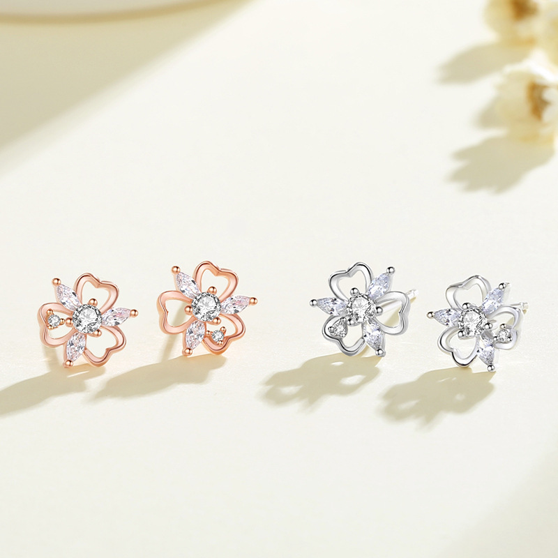 925 sterling silver clover snowflake earrings, featuring cubic zirconia flowers, a delicate and minimalist design, perfect for a forest-inspired look