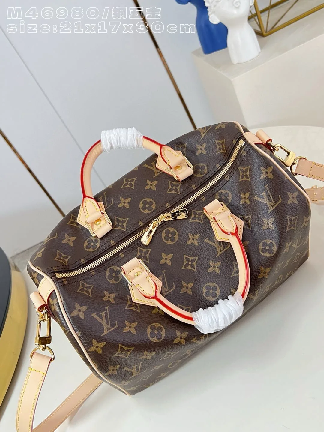 Louis Vuitton Canvas and Leather Speedy Top Handle Bag product photo from LabelPicks