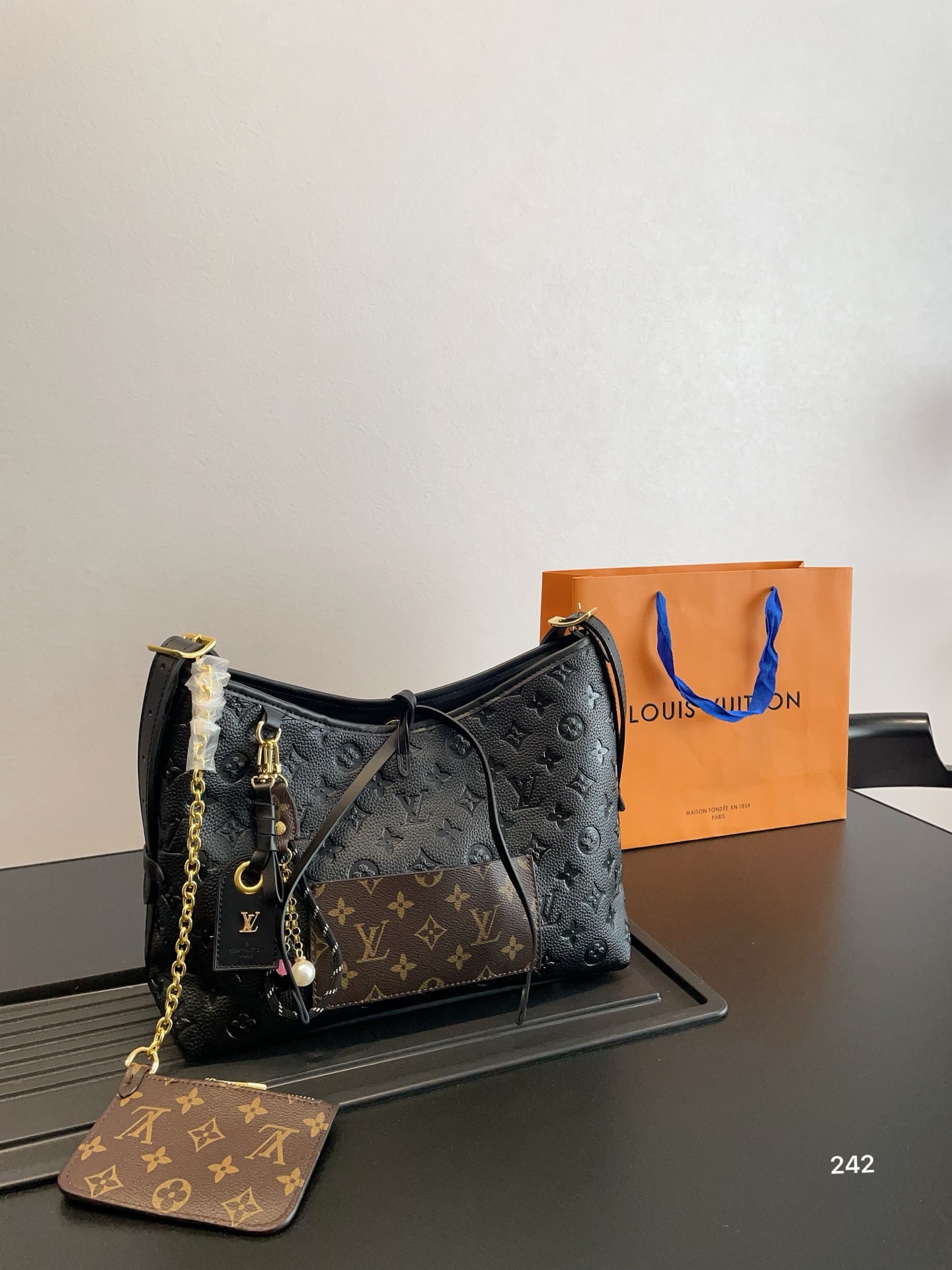 Lv Carryall commuter bag