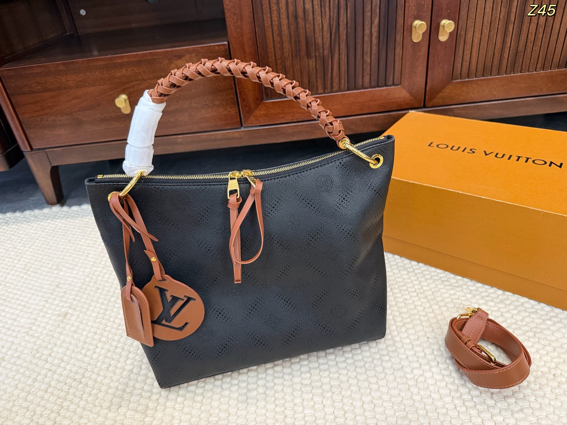 LV Perforated handbags