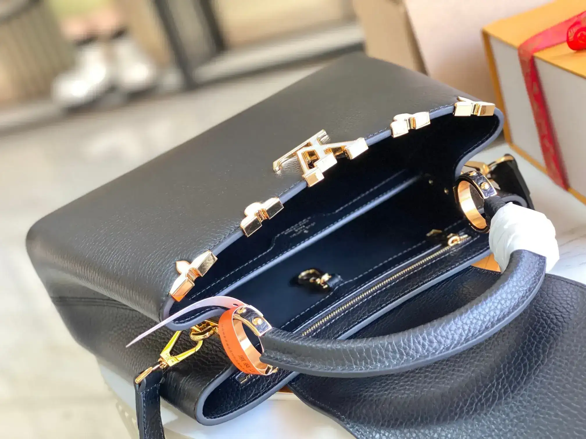 Louis Vuitton Capucines Black Grained Leather Crossbody Bag product photo from LabelPicks