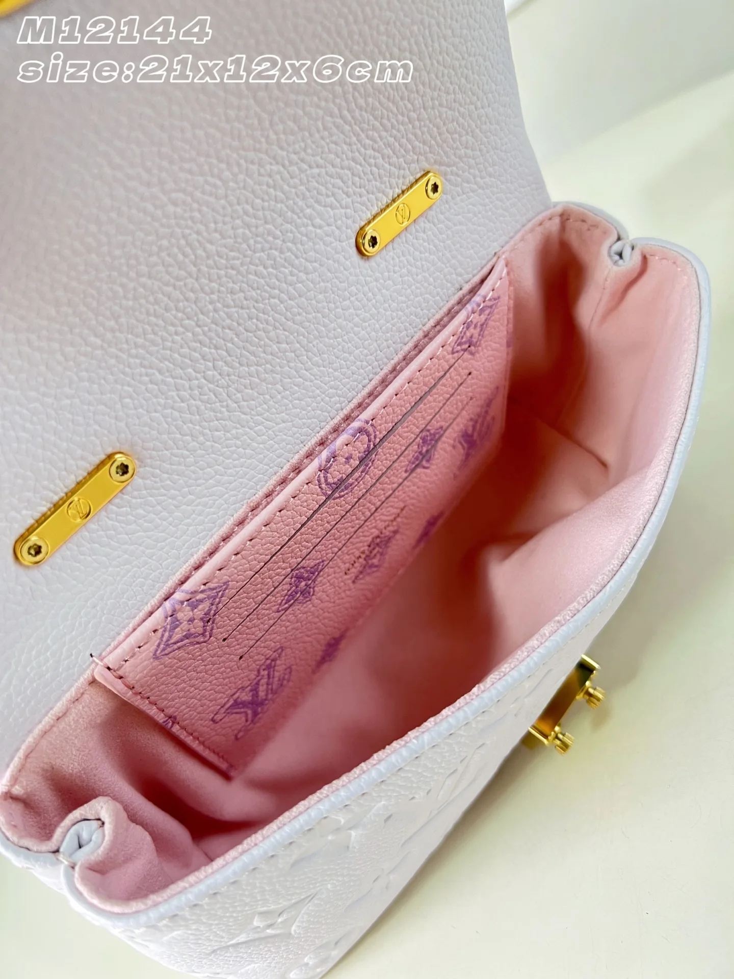 Louis Vuitton Madeleine Woven Leather Top Handle Bag product photo from LabelPicks
