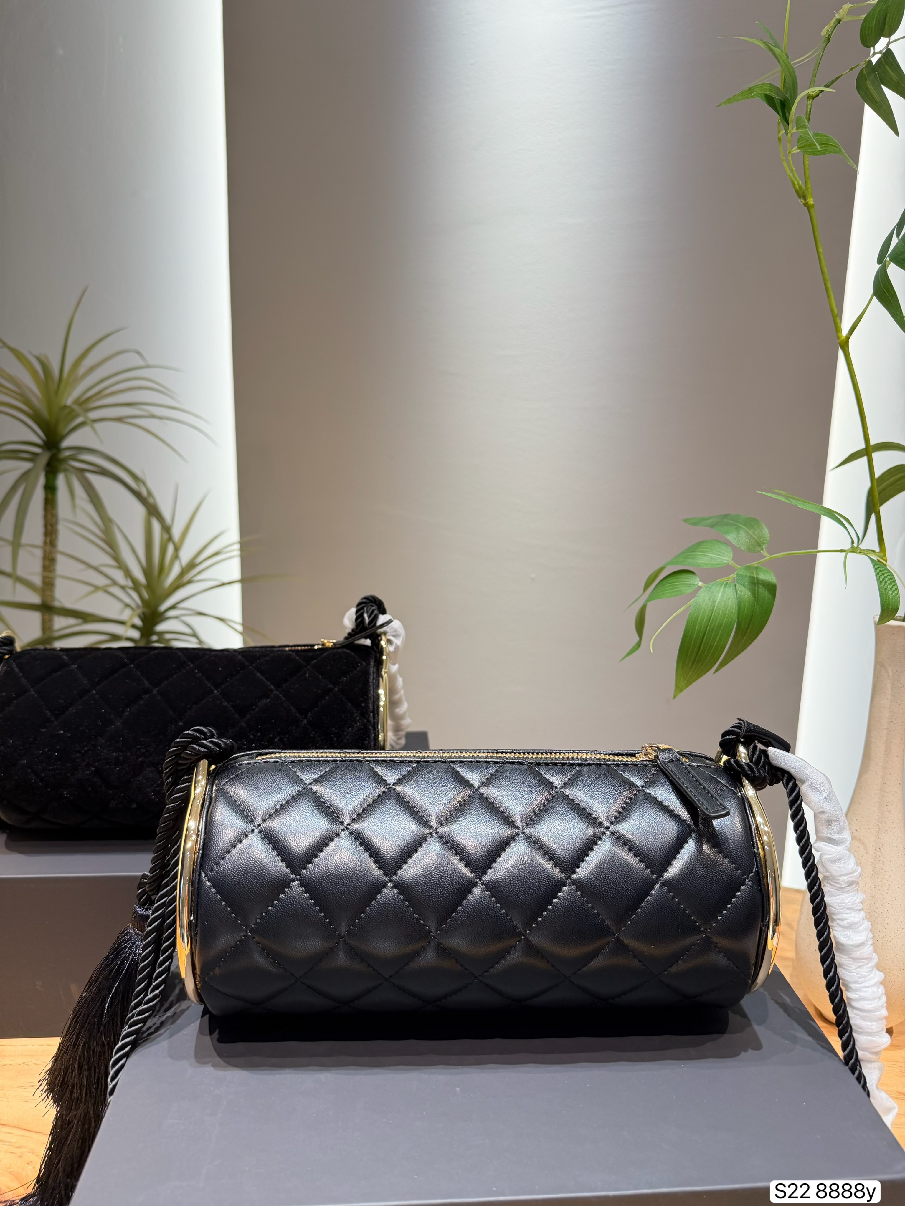 Chanel Quilted Zip Barrel Bag