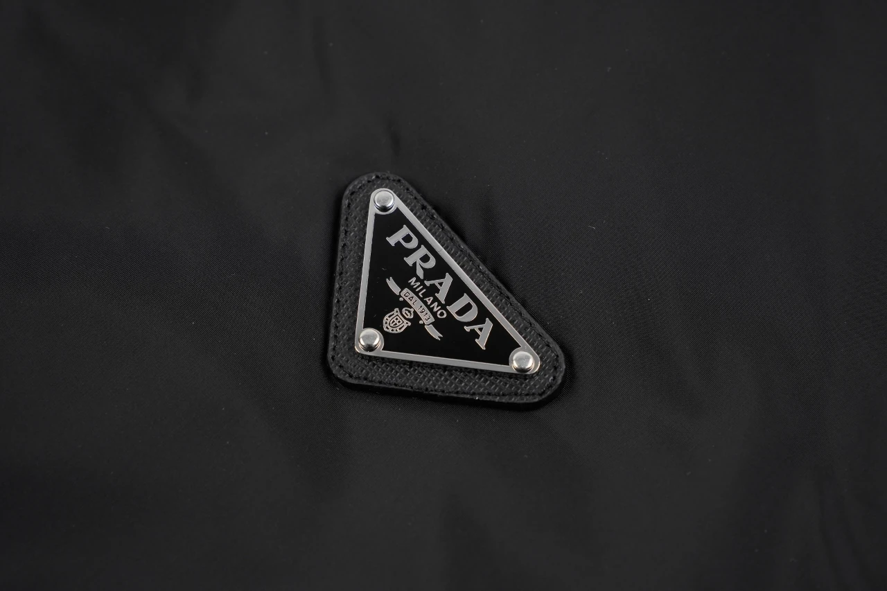 Prada Black Hooded Nylon Down Jacket with Metal Triangle Logo product photo from LabelPicks