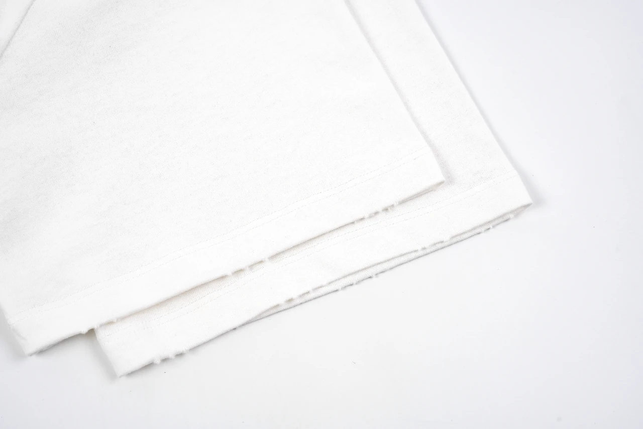 Prada White Distressed Badge Embroidered T-Shirt product photo from LabelPicks