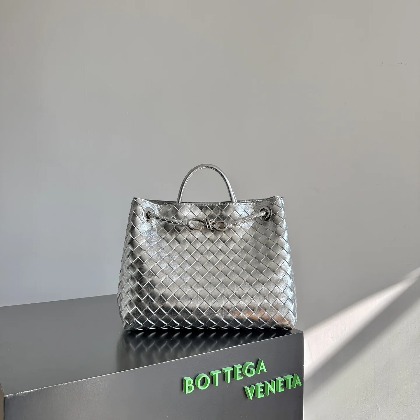Bottega Veneta Silver Andiamo Intrecciato Woven Leather Top Handle Bag product photo from LabelPicks