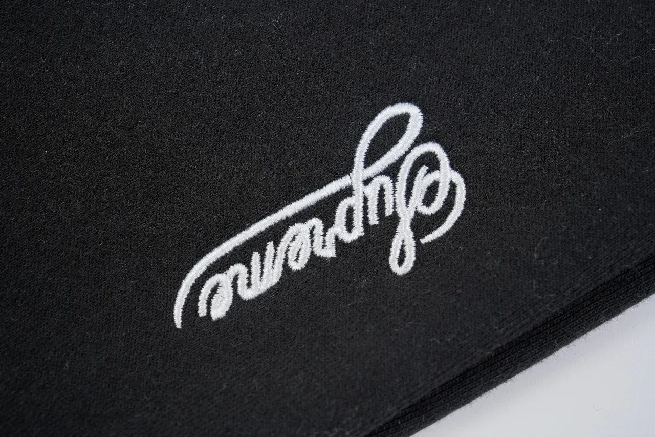 Nike Black Swoosh Embroidered Track Pants product photo from LabelPicks