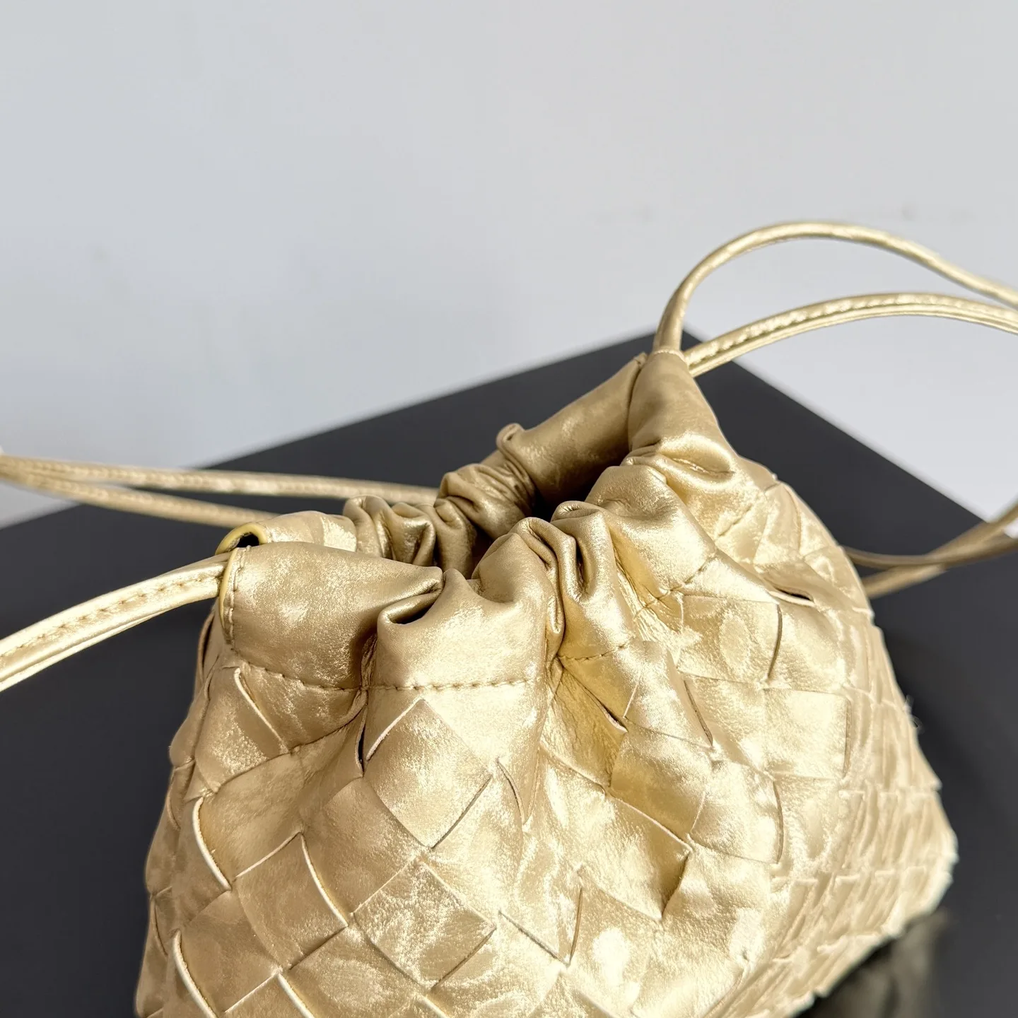 Bottega Veneta Dustbag Intrecciato Woven Leather Bucket Bag product photo from LabelPicks