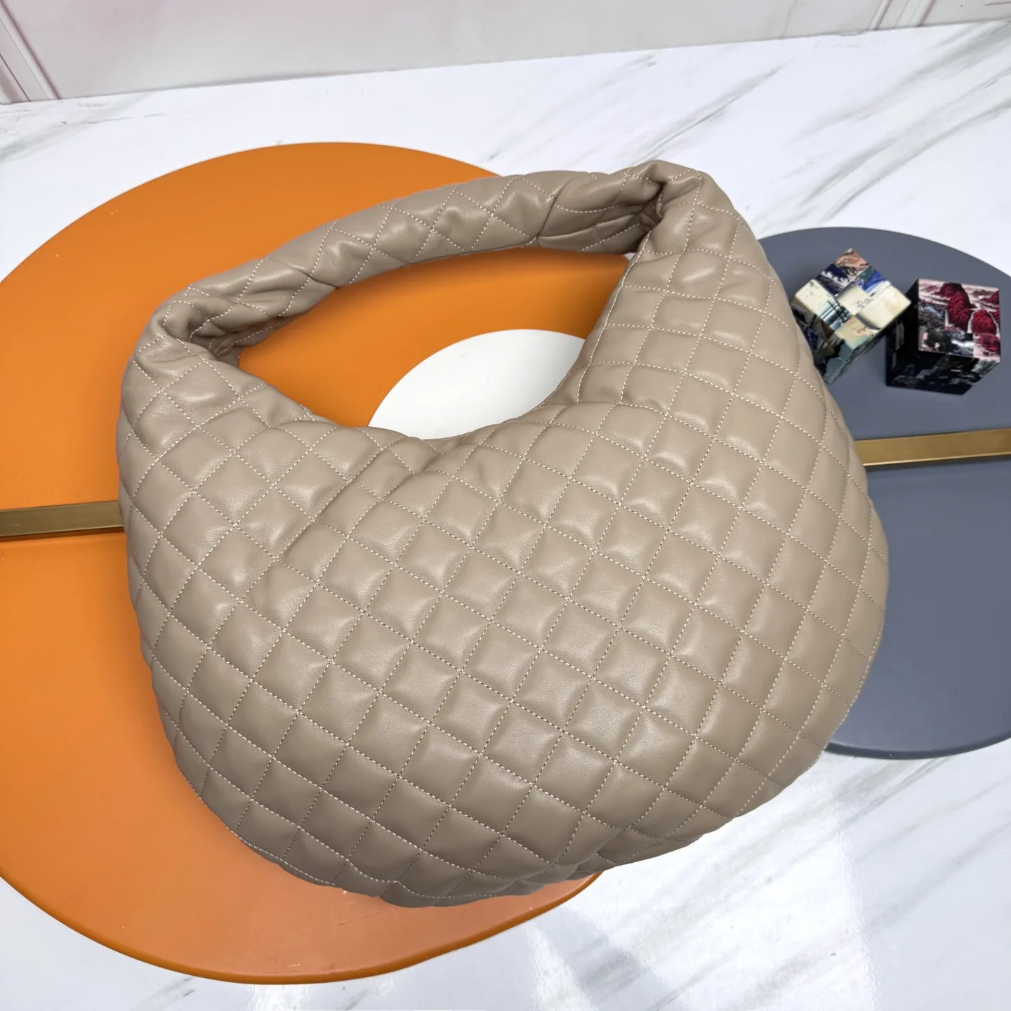 Saint Laurent Icare Beige Lambskin Hobo Bag product photo from LabelPicks