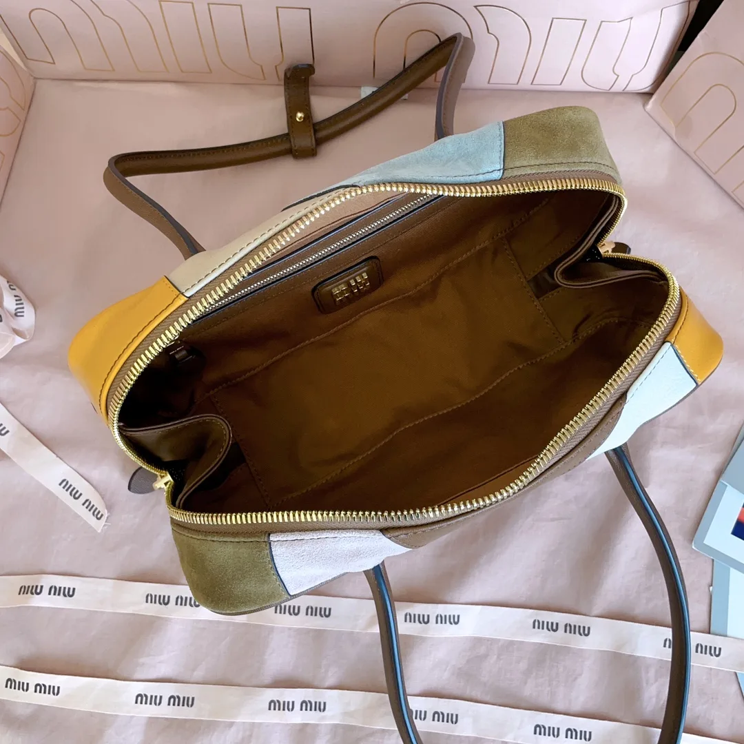 Miu Miu Canvas and Leather Top Handle Bag product photo from LabelPicks