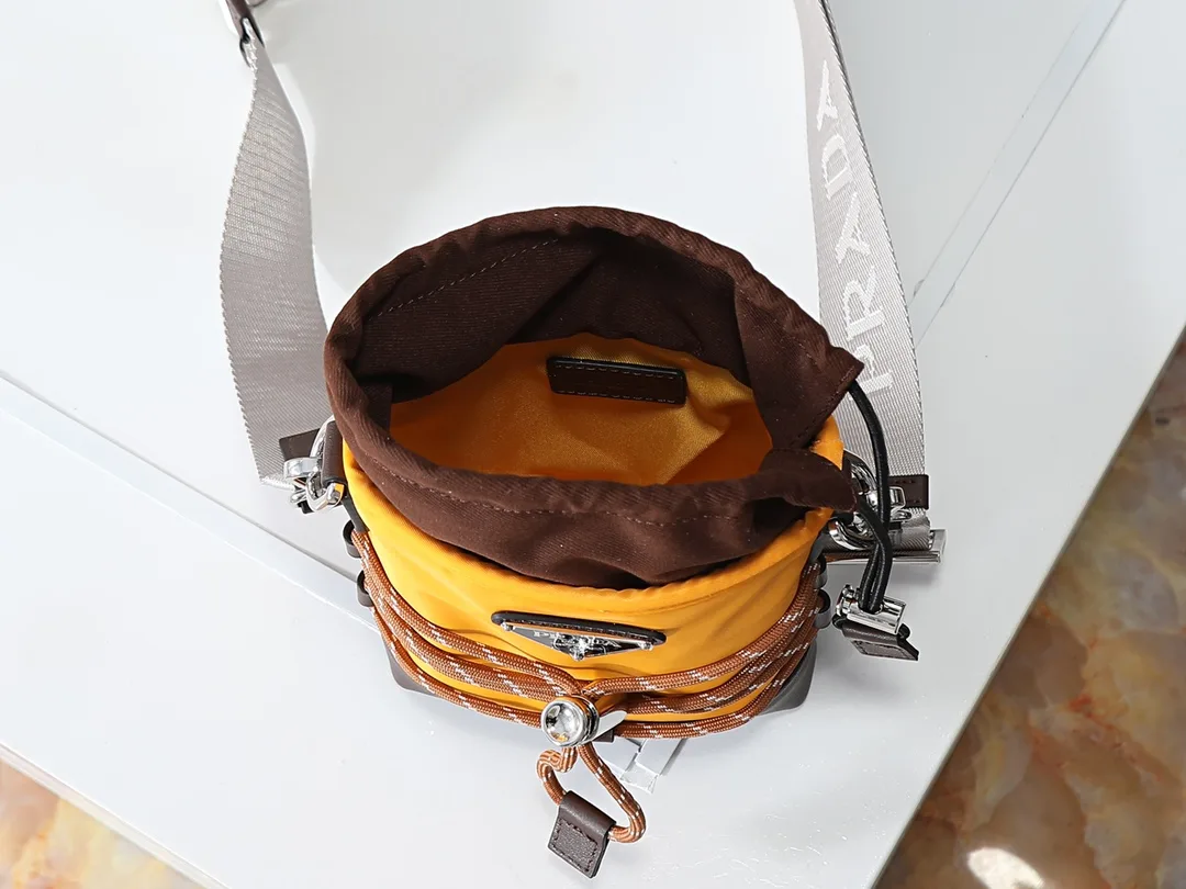 Prada Woven Leather Bucket Bag product photo from LabelPicks
