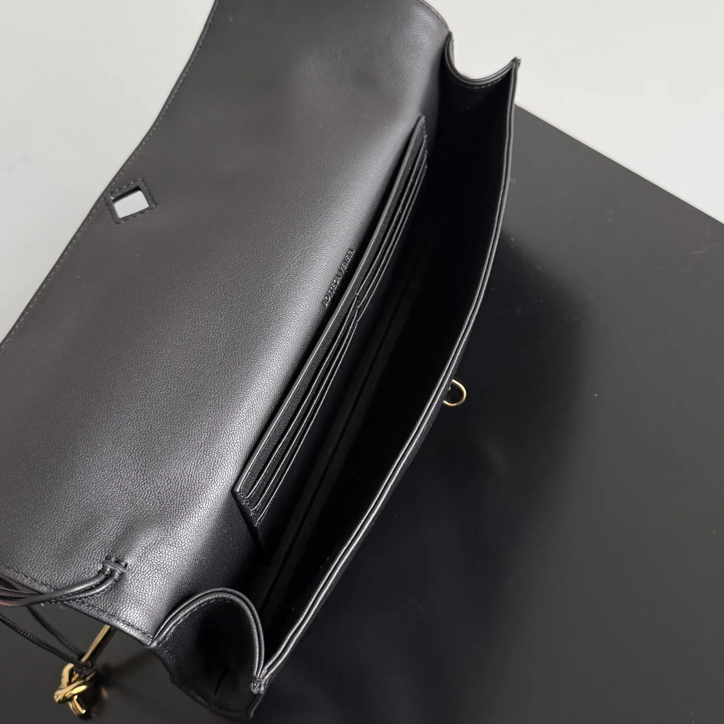 Bottega Veneta Andiamo Intrecciato Woven Leather Clutch product photo from LabelPicks